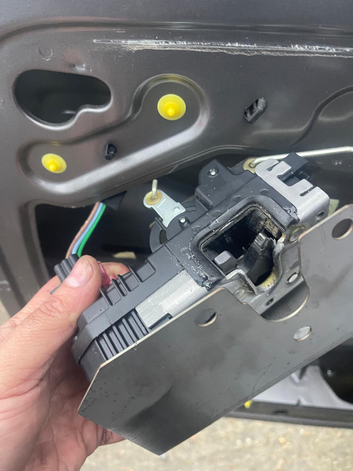 Internal door latch shielding removed for fitting